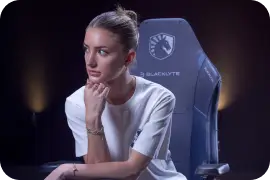 Woman sitting on the liquid edition gaming chair