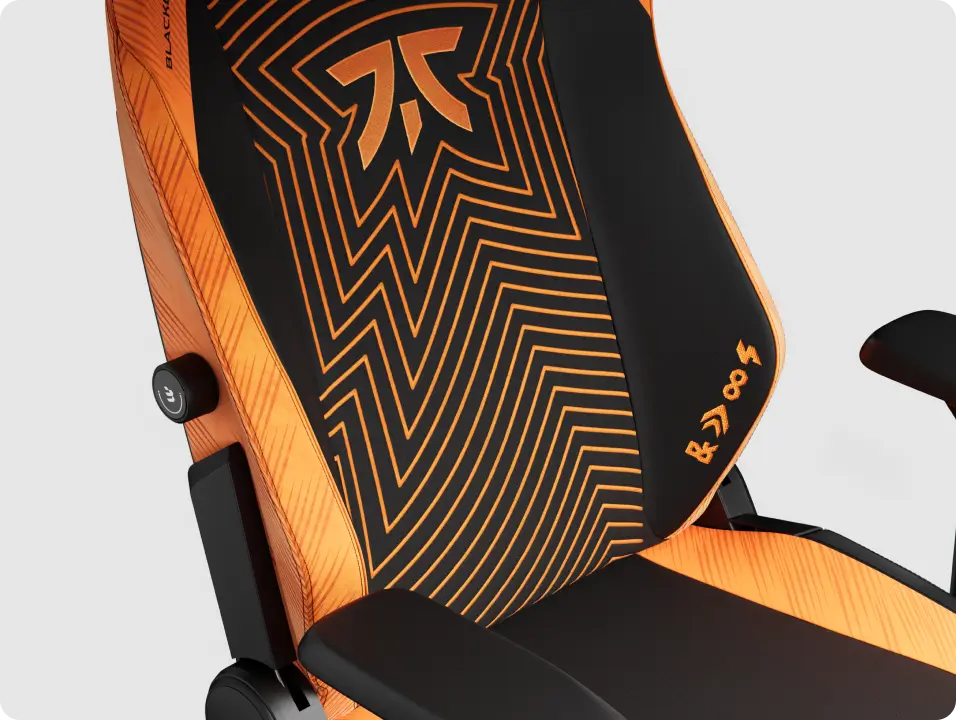 Ergonomic Fnatic gaming chair with adjustable armrests and high back